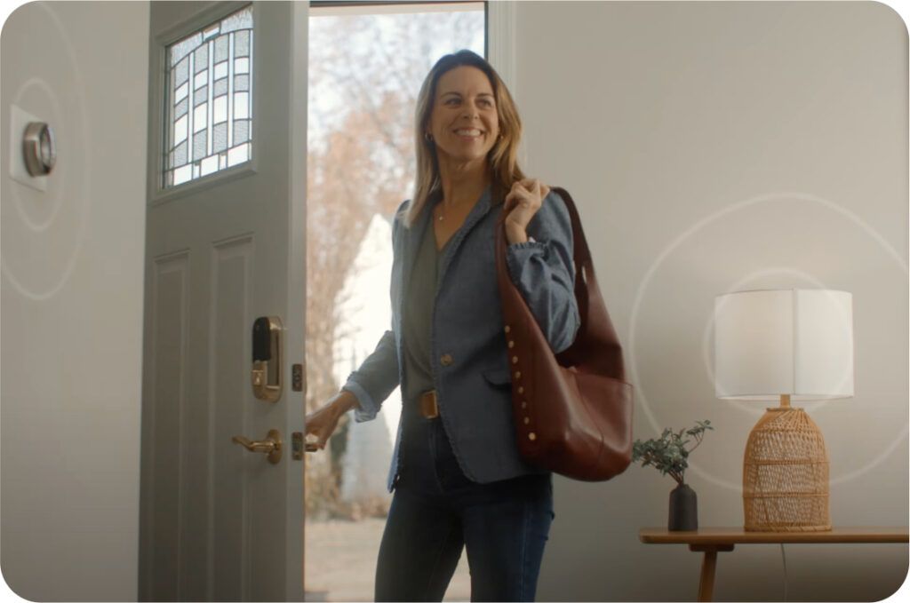 woman at door of home