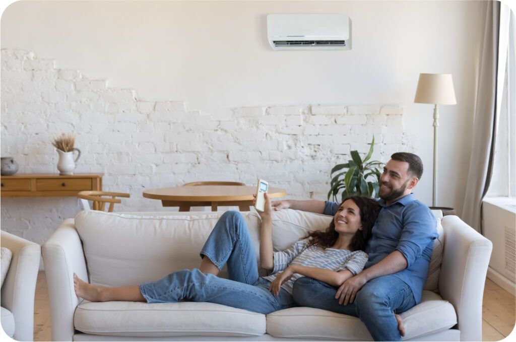 couple cuddling on sofa