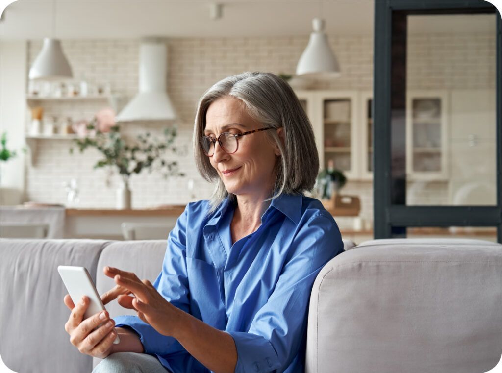 woman holding mobile device